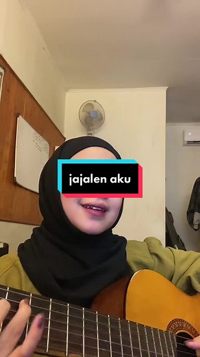 Acoustic Guitar Performance in a Cozy Room Setting