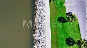 overhead aerial footage along the banks of Lake Pontchartrain at Lakeshore Park in New Orleans Louisiana USA