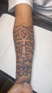 Ancient power brought to life 🔥 The Ankh, symbol of eternal life, joined with the Eye of Ra 👁️, a mark of divine protection, strength, and power. A reminder that life and light always prevail. ☀️ #AnkhTattoo #EyeOfRa #EgyptianTattoo #SymbolOfLife #DivinePower | Omnificent Tattoo Studio
