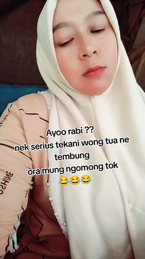 Humorous Filipino Text Overlays in Indoor Setting