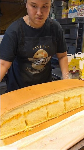 Taiwanese egg sponge cake filled with golden egg yolk threads #shorts #streetfood #sidehustle