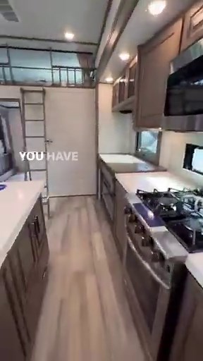 Mind Blowing RV Layout. What do you think? Grand Design RV #rvliving #camper #camperlife #rvlife #rv #rvfamily #travel #travelfamily | Less Junk, More Journey