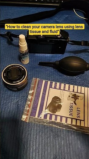 how to clean your camera lens with cleaning tissue and fluid.