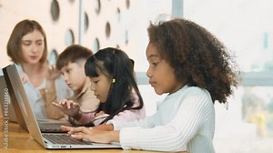 Smart teacher check student answer while learner using laptop to doing homework, analysis data, programing engineering code, studying computer system at STEM technology class. Site view. Erudition.