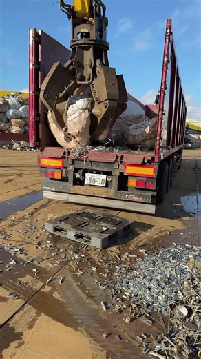 Industrial Machinery in Action at a Scrapyard