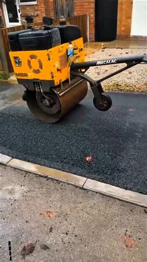This Machine Makes Perfect Asphalt in Tight Spaces | Mecalac MBR71 Trench Roller