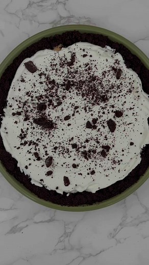 Indulge in this low-lactose peanut butter pie with a twist! There's nothing like peanut butter and chocolate, and this dessert gives you the best of both. This peanut butter pie is rich and decadent, and the best part is that it's low in lactose. By combining just a smidge of lactose-free milk with the cream cheese and heavy cream, you can indulge a bit more without guilt or a pill. Crust: 10 oz chocolate wafers or 24 Oreos 1/3 cup sugar 7 tbsp melted unsalted non-dairy butter Filling: 1 cup cre