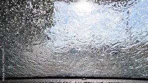Automatic car wash, view from inside the car interior in Brazil