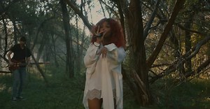 Watch SZA perform an enchanting rendition of “Go Gina” in the forest
