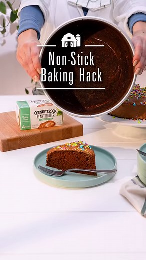 Cocoa powder and Country Crock Plant Butter combine for this non-stick baking #hack. Do you have a favorite non-stick hack? Share it below 👇 Love this chocolate cake? Check out the full recipe here: https://bit.ly/3TX1ZaC | Country Crock