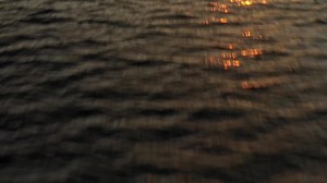 Free stock video - Flying over ocean towards sunset