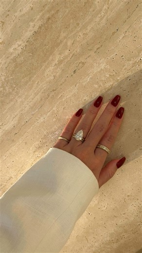 EARTHENA on Instagram: "One iconic center, layered with edge and sparkle. Say hello to your forever stack 🔥❤️‍🔥 Featuring 🤍The Axis, 5ct Elongated Pear-Cut Lab-Grown Diamond Hidden Eternity Halo Engagement Ring 🤍Axis Duo Pavé Knife-Edge Eternity Band 🤍Axis Duo Pavé Knife-Edge Pinky Ring 🤍The Remi, Pavé Dome Diamond Ring pear cut engagement ring // lab grown diamond engagement ring // hidden halo engagement ring // pavé knife edge band // eternity d