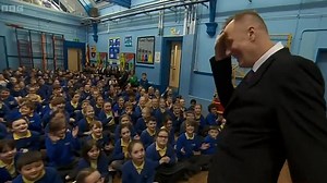 Sweet moment headteacher returns after being saved by defibrillator
