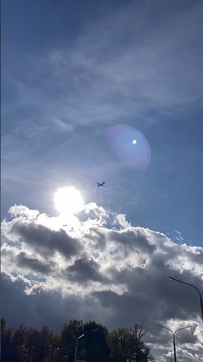 Antonov An-26 through the sun