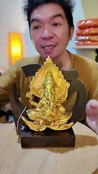 Lord Ganesha, granting 1000 blessings - holding Modak sweets and flowers. Buddhist Scripture Prom...