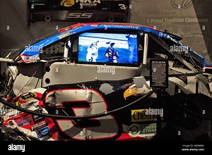 Austin Dillon's crashed car and video display at Bass Pro Shops Motorsports Museum in Springfield, MO, USA Stock Photo - Alamy