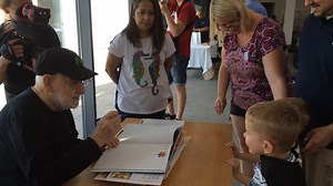 Eric Carle did annual book signings at the Museum for many years. Before we even opened, the line would circle around the Museum. Many of the people would have driven all night to get here. Eric enjoyed meeting his fans, especially the children. #EricCarleArtist | The Eric Carle Museum of Picture Book Art