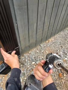 Installing a downspout and extension to keep water flowing away from the foundation. Small detail, big impact! #raybanmeta #howto #gutters #relatable #homeimprovement #gutter #diyproject #fyp #trending #pov #foryou | DuckDive