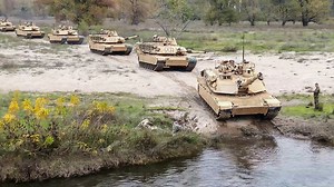 US Largest Tanks Jump into Deep Water During Intense River Crossing