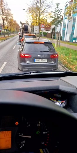 First-Person View Inside Vehicle Following Audi Car