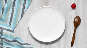 Cooking strawberry cake and eating it piece by piece. Stop motion.