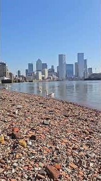 Beach on the Thames with a view of the Isle of Dogs