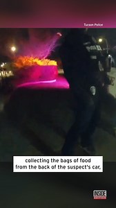 When a delivery driver got arrested during a shift, an officer made sure his customer didn’t starve. Tucson Police released this bodycam video of an officer collecting the bags of food from the back of the suspect’s car, then carrying them to the address, where a confused customer accepted the delivery. | Inside Edition