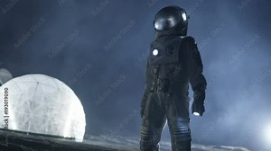 Courageous Astronaut in the Space Suit Holds Flashlight and Explores Alien Planet Covered in Mist and Smoke. Adventure. Interstellar Space Travel, Habitable World.