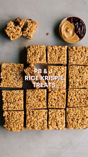 Peeps, happy #nationalpeanutbutterandjellyday to all those who celebrate. Sharing my BELOVED PB&J Rice Krispies Treats in honor of this special holiday. Comment “PBJ” and I will DM you the easy-peasy, super delicious and fun recipe. 🩷 | Jessie Sheehan Bakes