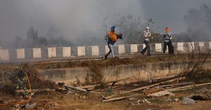India security forces fire tear gas at protesting farmers on drive to Delhi
