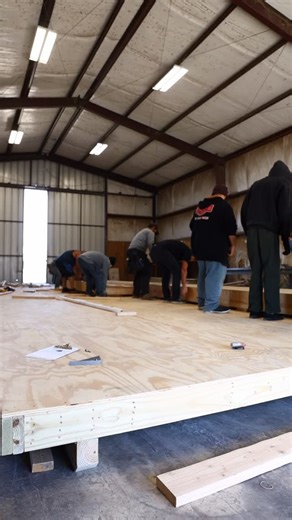 🏗️ 2x6 framing lap siding = one heavy wall. Good thing we’ve done this a few times. 💪 #EagleRidgeBarnBuilders #BuildingStrong | Eagle Ridge Barn Builders LLC
