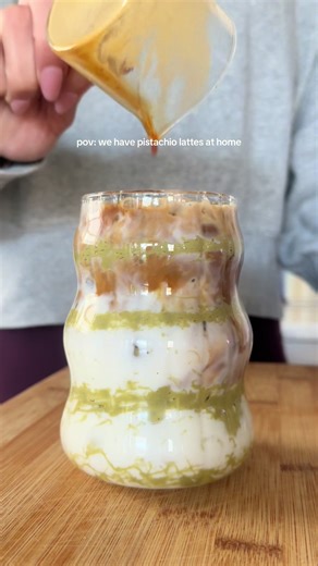 Don’t sleep on this pistachio syrup!! It was so easy and makes an incredible latte 😍 Pistachio Syrup: • 1 cup turbinado sugar • 1 cup roasted pistachios • 1 cup water • 1/2 tsp almond extract Cook syrup on stove at medium-high heat until sugar dissolves then reduce to a simmer for 15-20 minutes. Let cool before adding almond extract. Pistachio Latte: • Double shot of espresso • 1 tbsp pistachio syrup • Ice • 6-8 oz milk • Optional: line glass with pistachio cream Enjoy! #coffeetok #coffeetiktok