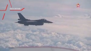 Watch a NATO F-16 fighter being directed away from the Russian defense minister's plane in Baltic airspace by a Su-27 jet. | Russia's armed forces Вооруженные силы России