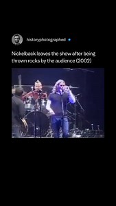 History Photographed on Instagram: "Nickelback was forced to end their performance prematurely at the 2002 Ilha do Ermal festival in Portugal after an angry crowd began pelting them with rocks and bottles.⁠ ⁠ After the lead singer was struck in the back of the head, the band walked off stage, famously flipping off the audience as they exited.⁠ ⁠ Credit: SIC"