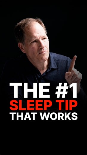 The Diary Of A CEO. on Instagram: "Your wake up time sets your sleep clock... Comment ‘Sleep’ and I’ll personally DM you our conversation. Dr Michael Breus explains that waking up at the same time every day is more important than going to bed at the same time. Morning light signals the brain to stop melatonin and starts a timer that runs for about fourteen hours before sleepiness returns. Sleeping in shifts this cycle later, making it harder to fall asleep at night. A consistent wake up time oft