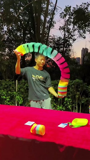Mesmerizing Street Shows with Rainbow Metal Slinky