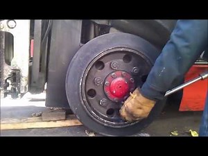 How to press and change tires on a Toyota forklift