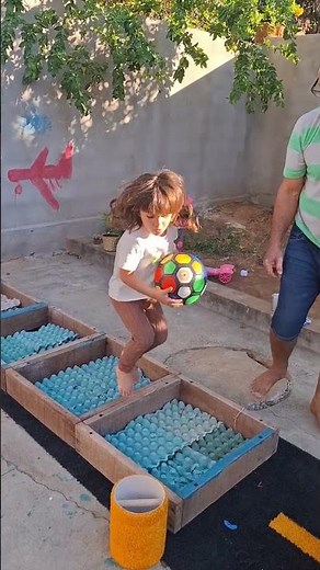 Children's circuit: obstacles, sensory mat and tunnel with giant ball.