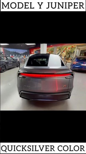 2026 Tesla Model Y Juniper Quicksilver Exterior Rear Illuminating Tesla Logo