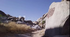 Low angle shot of rocks and boulders at Coyote Hole in Joshua Tree National Park, California, well known for it's old historical geoglyphs and pictographs made by Native Americans long ago.