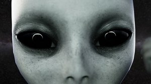 Alien open eyes. Planet Earth is reflected in the eyes . UFO futuristic concept. Cinematic 4k animation.