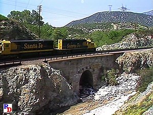 77K views · 1K reactions | Three engines on the lead, a caboose and two helpers take a Santa Fe intermodal train past Blue Cut. From the Pentrex show "Cajon Pass - The Gateway to LA" https://rfd.video/Cajon1987 | Railfan Depot | Facebook