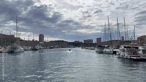 Old port of Marseille (Vieux-Port de Marseille). Marina full of yachts. View from a moving boat. Arrival at port, harbour. Marseille, Cote d'Azur, France