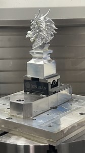 1.6K views · 33 reactions | A vertical machining centre or VMC is the most common 5-axis CNC configuration. The spindle moves up and down the z-axis and contacts the part from above. A 5-axis VMC typically rotates around the a and b axes on a trunnion with a rotating table. #5axis #cnc #machine #vmc #common #configuration #spindle #contact #typical #rotate #table | SYNE Machines | Facebook