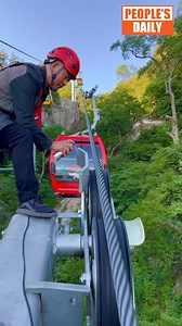 26K views · 588 reactions | You might have taken cable cars, but not really understood how they work. This footage from a worker's perspective shows you the maintenance of a cable car system on #LaojunMountain in #Henan Province. The worker is protecting the steel cable from rust and corrosion. | Xi's Moments | Facebook