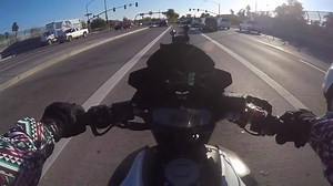 Girlfriend takes over the motorcycle controls and gives the rider a passenger experience