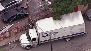Box truck hits utility pole in Waltham
