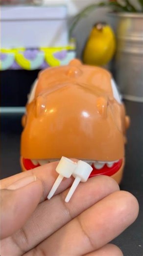 Angry Dino eating birthday candle holders #candle #asmrsounds #satisfying #viralshort #shortvideo