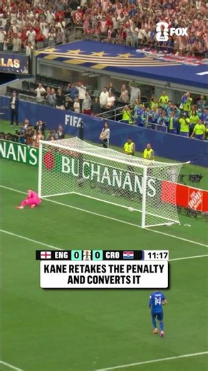 Harry Kane retakes the penalty after the Croatian goalkeeper came off the line early and converts it