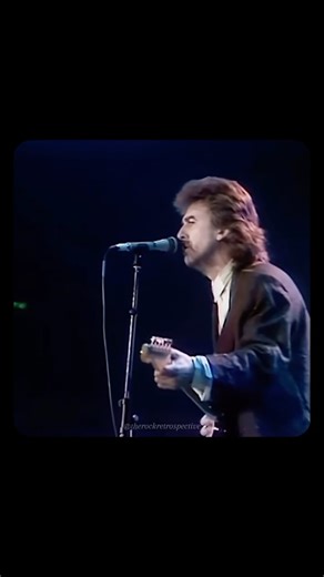 TheRockRetrospective on Instagram: "George Harrison, “While My Guitar Gently Weeps” (Live, 1987). At the Prince’s Trust Rock Gala in London, June 1987, George Harrison reunited with Eric Clapton and Ringo Starr to perform his Beatles classic. Backed by an all-star lineup including Mark King, Elton John, and Phil Collins, the song took on new life nearly two decades after its release on The White Album. Clapton, who played lead guitar on the 1968 recording, once again delivered soaring solos—this